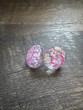 Pair of Clear Resin Smile Stud Earrings with Purple Glitter
